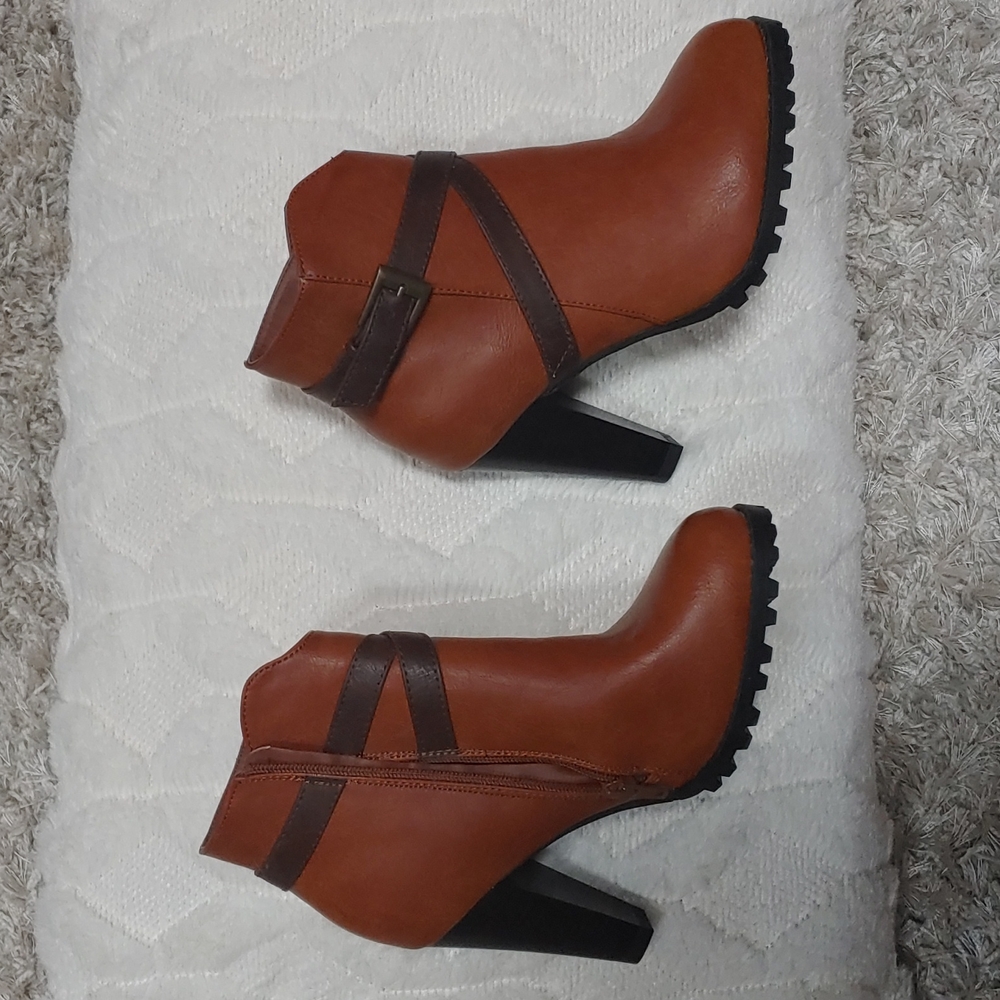Light brown heeled ankle boots with side zipper